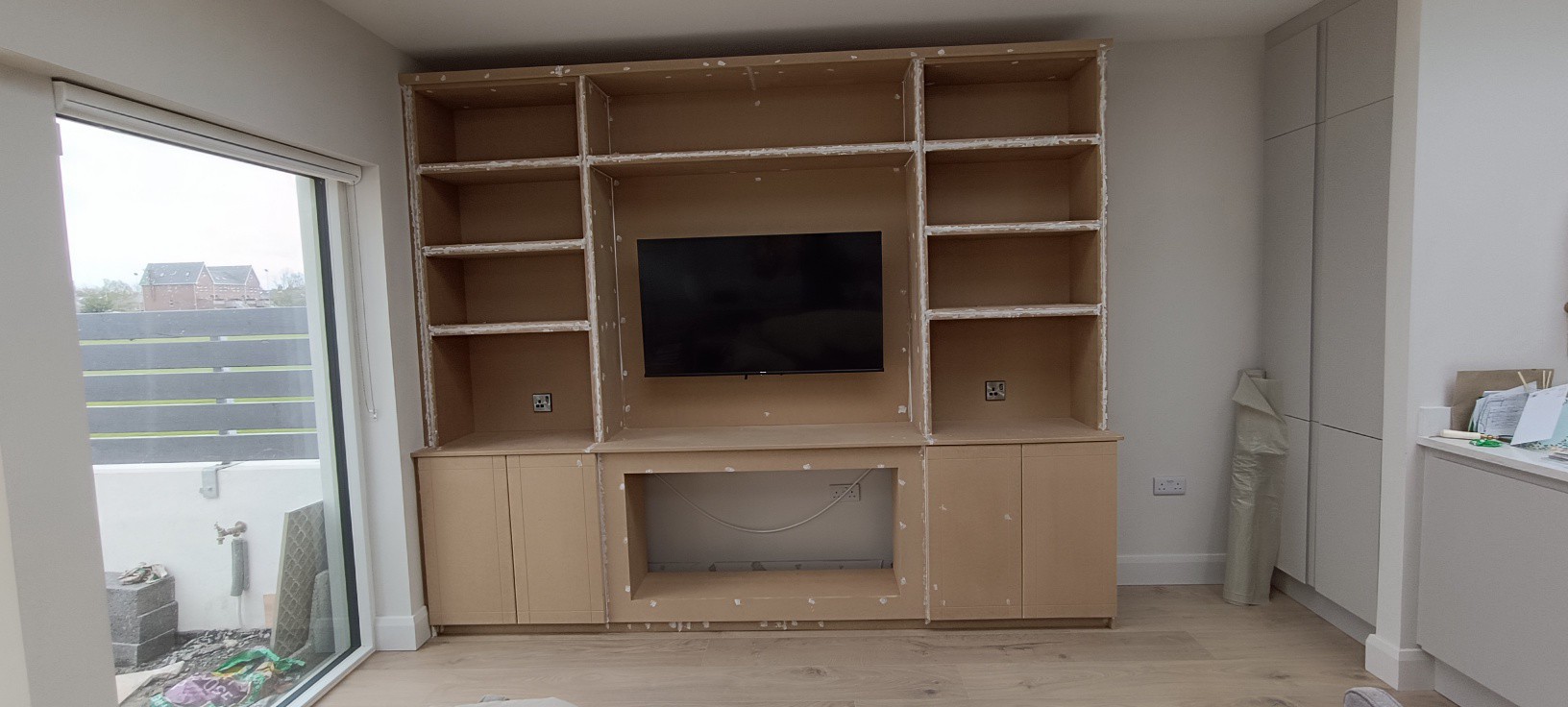 Bespoke media wall under construction in MDF